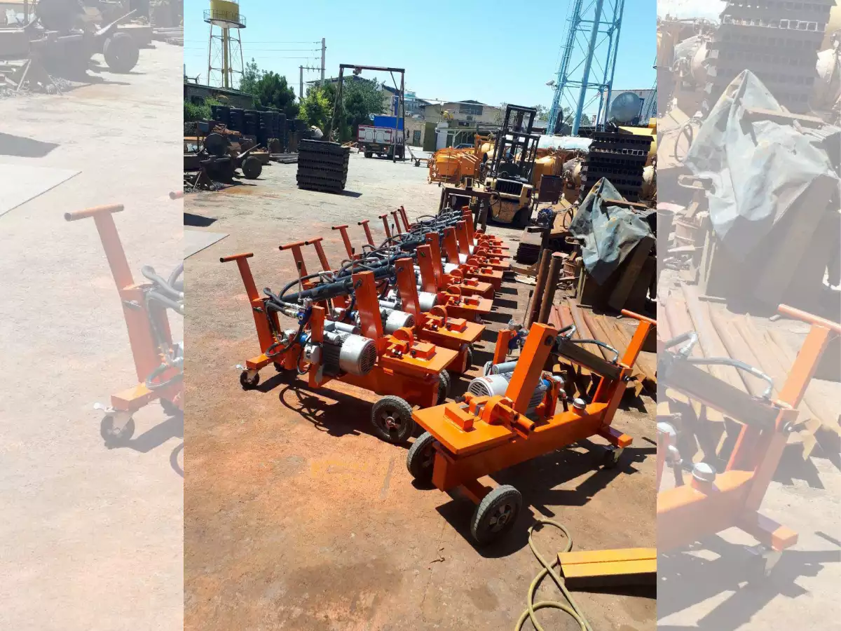 تعداد زیادی قیچی برش میلگرد داخل کارگاه کنار یکدیگر